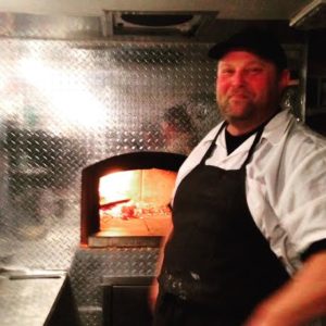 The Chef, Josh getting the wood fired oven going