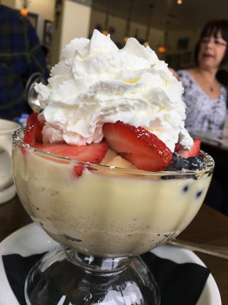 Breakfast Polenta: Served with Creme Anglais, Fruit and Whipped Cream 