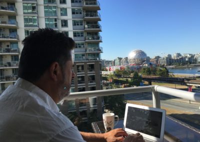 Jeff Writing on the balcony